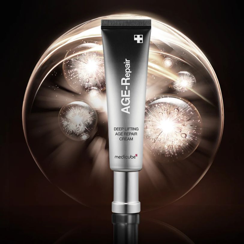 Tube of AGE-Repair Deep Lifting Age Repair Cream with a dark background and light effects